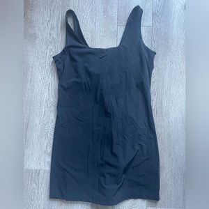 Nike Active lined Dress. Built in bra and shorts with pocket. Size medium. NWOT